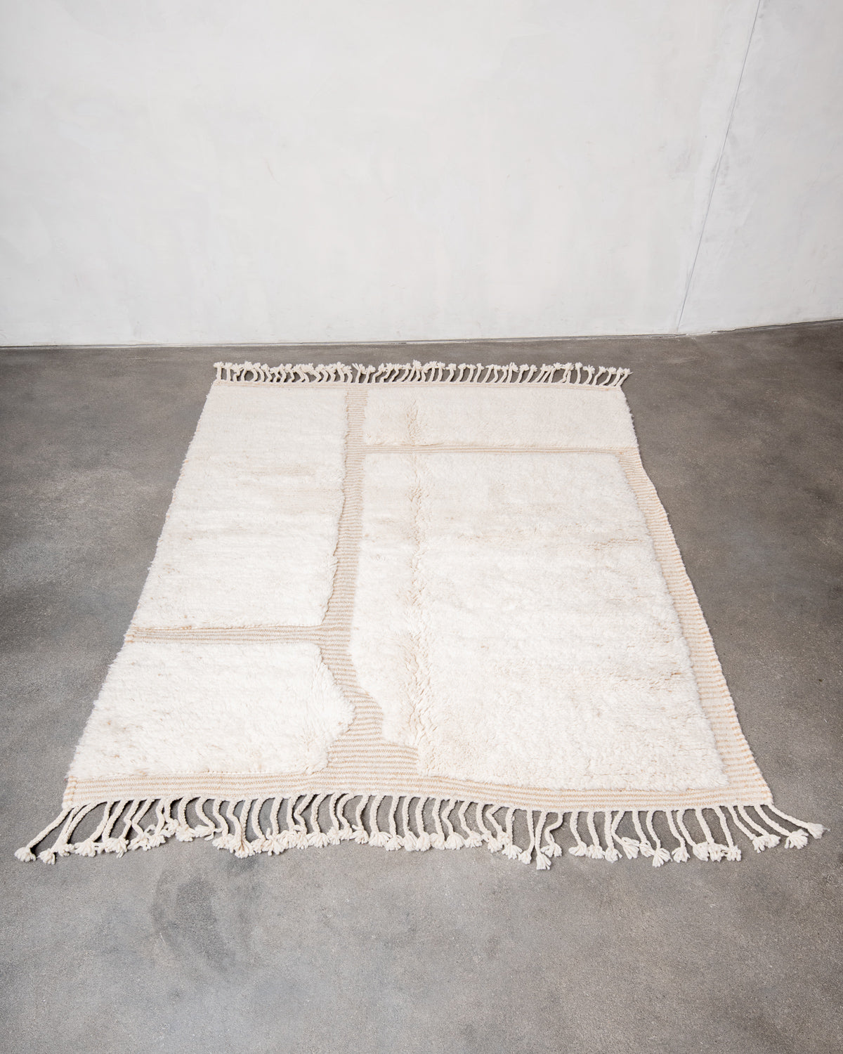 Modern, designer, handcrafted Berber rug from Morocco. Beniourain carpet with beautiful colours and patterns and fluffy wool texture.